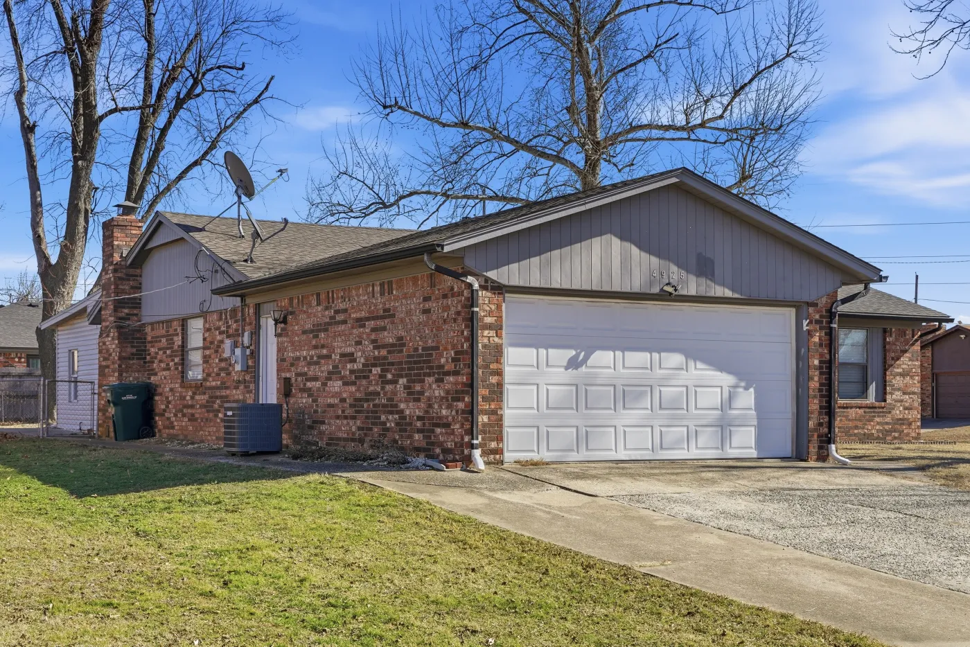Home with a completed R&R roof in the Tulsa metro