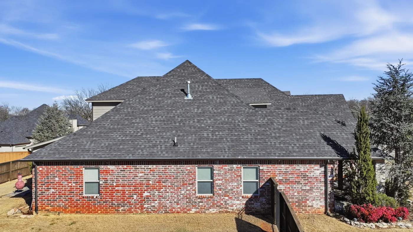 Home with a completed R&R roof in the Tulsa metro