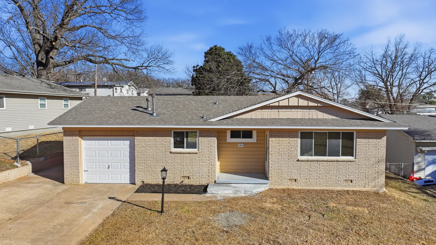 Home with a completed R&R roof in the Tulsa metro