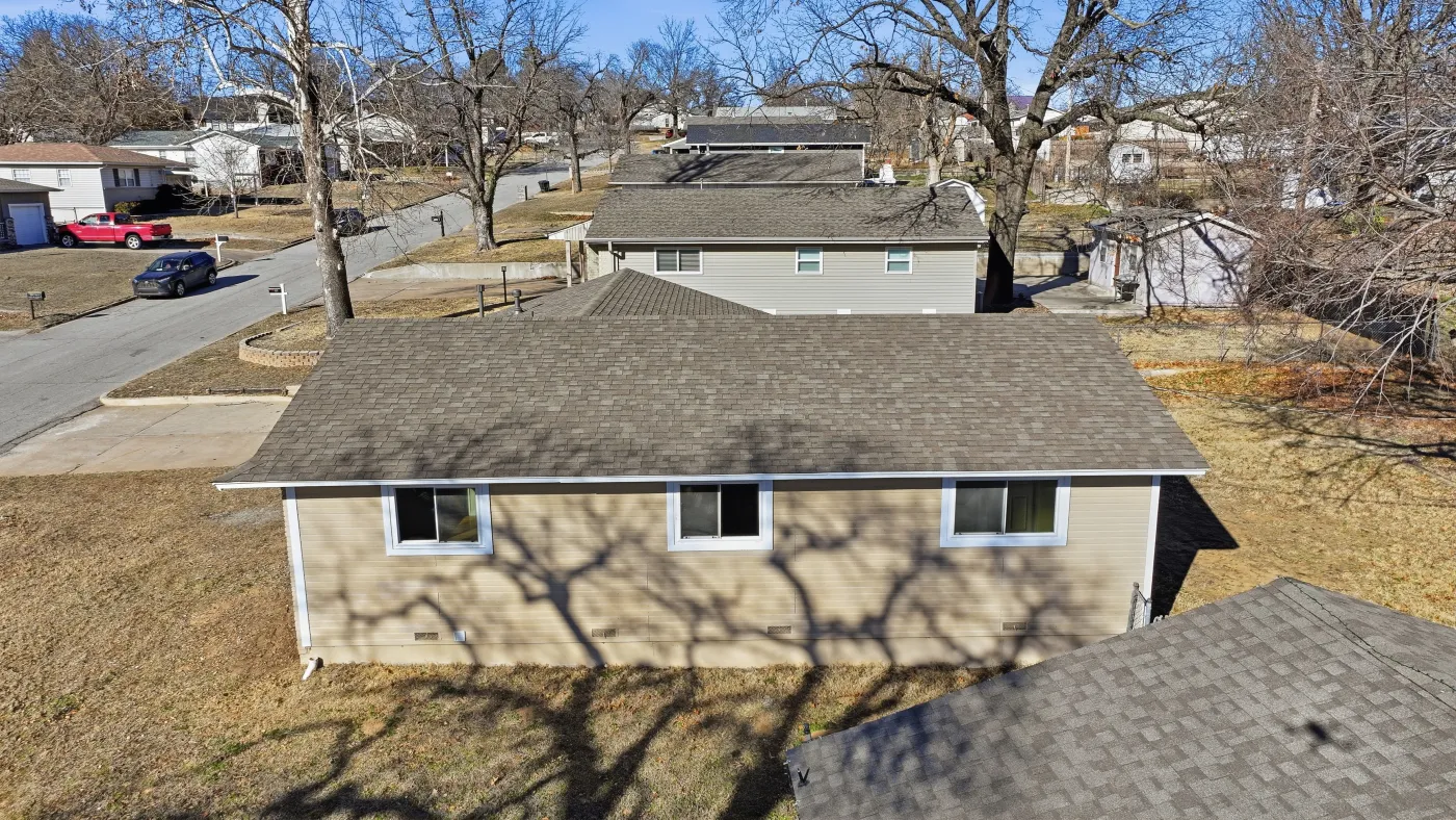 Home with a completed R&R roof in the Tulsa metro