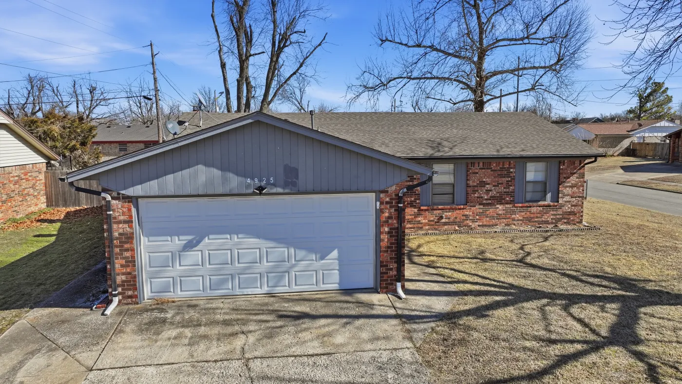 Home with a completed R&R roof in the Tulsa metro