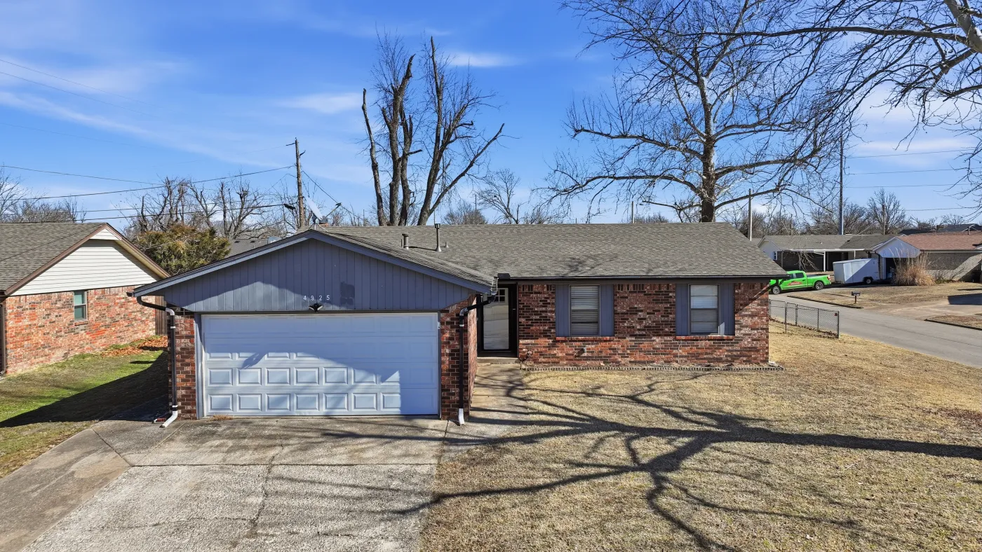 Home with a completed R&R roof in the Tulsa metro