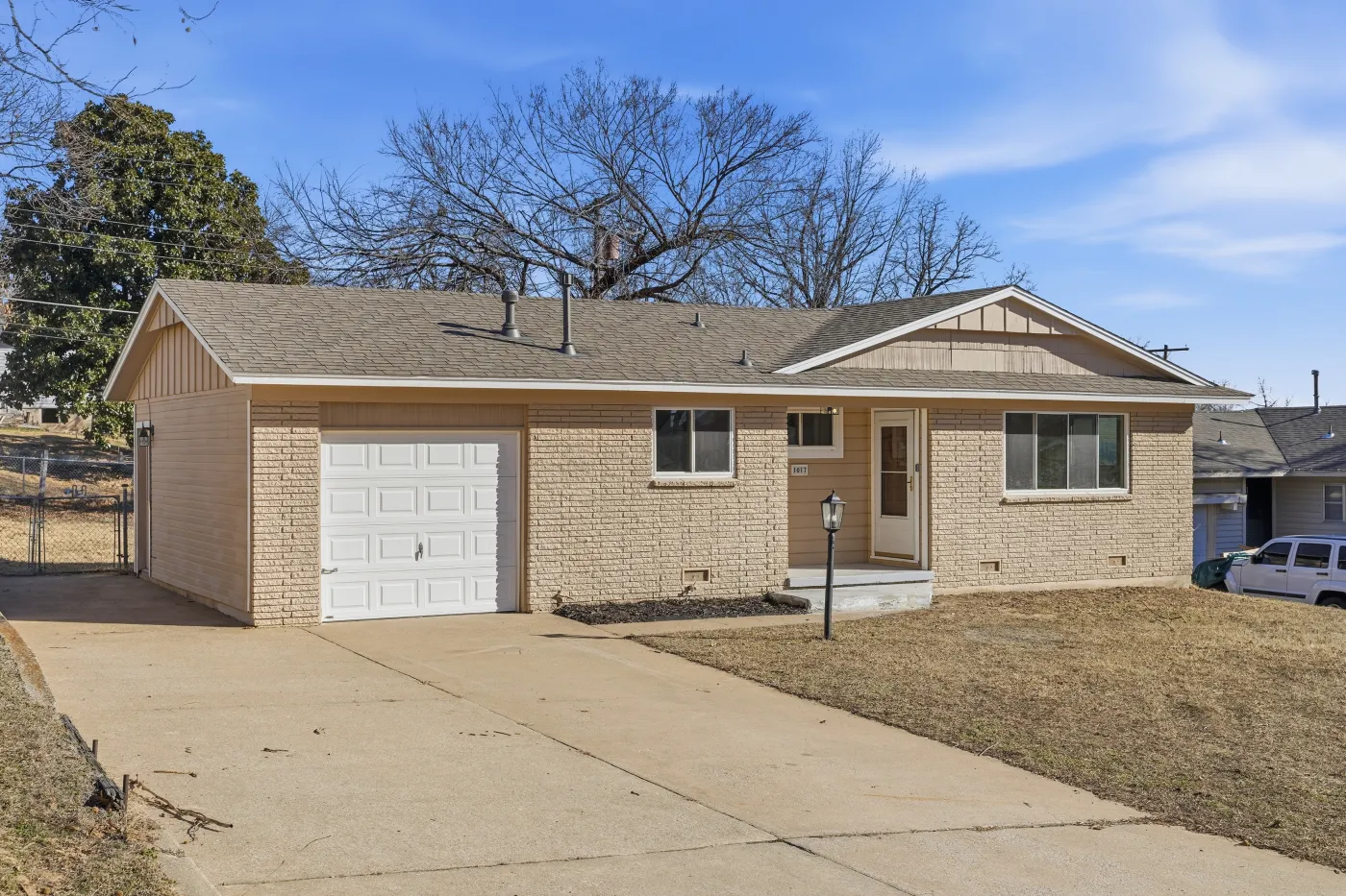 Home with a completed R&R roof in the Tulsa metro